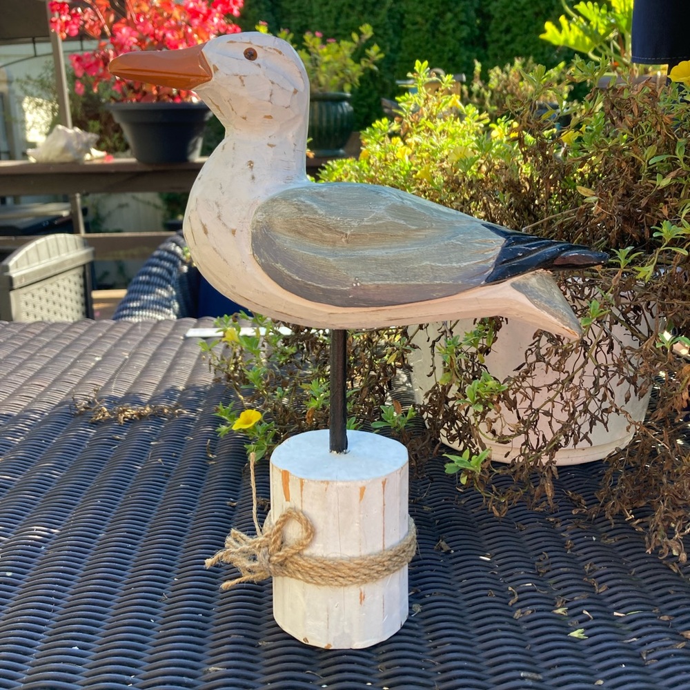 Beachcombers' seagull white piling figure
